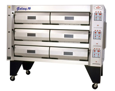 stainless steel commercial kitchen oven with three decks